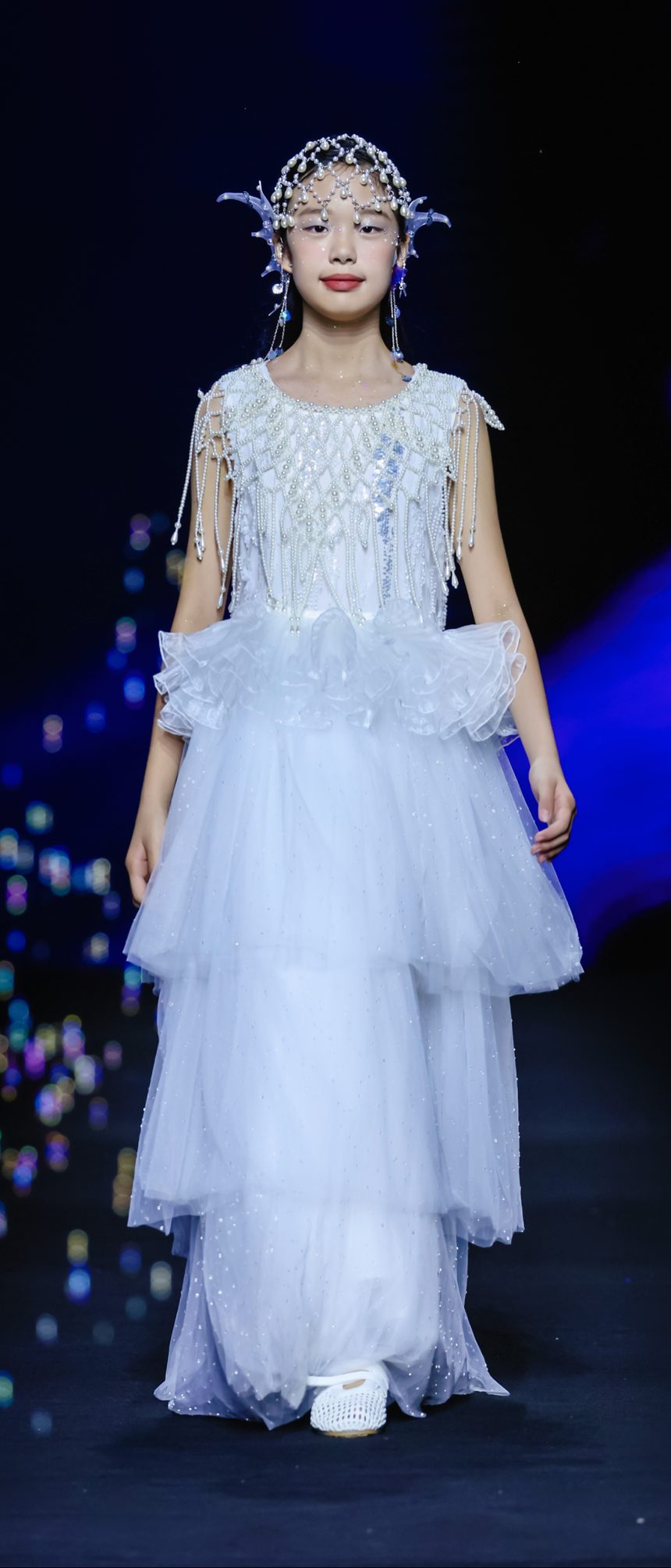 DC Kids complete look — tiered gown with pearl headpiece