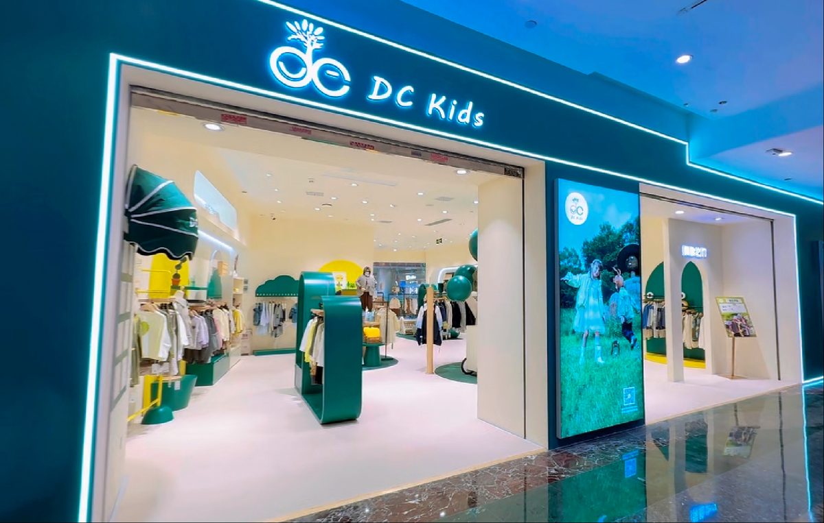 DC Kids illuminated mall storefront with campaign lightbox